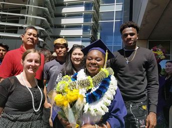 Banks celebrates her graduation with family
