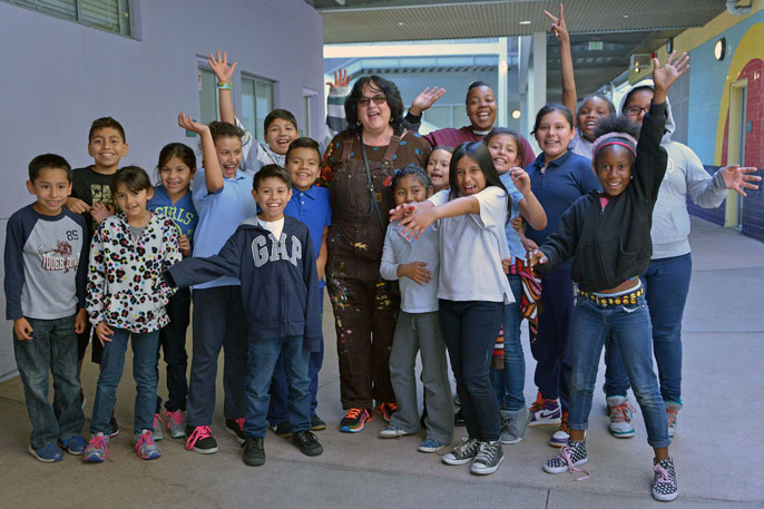 Baca and students at the Judith F. Baca Arts Academy in Watts.