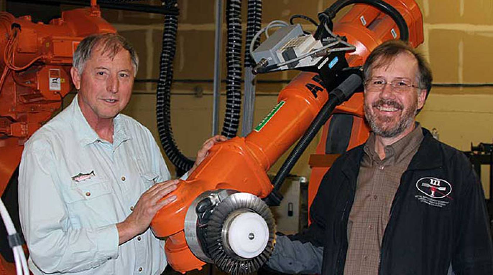 Lloyd Hackel, Brent Dane and peening robot