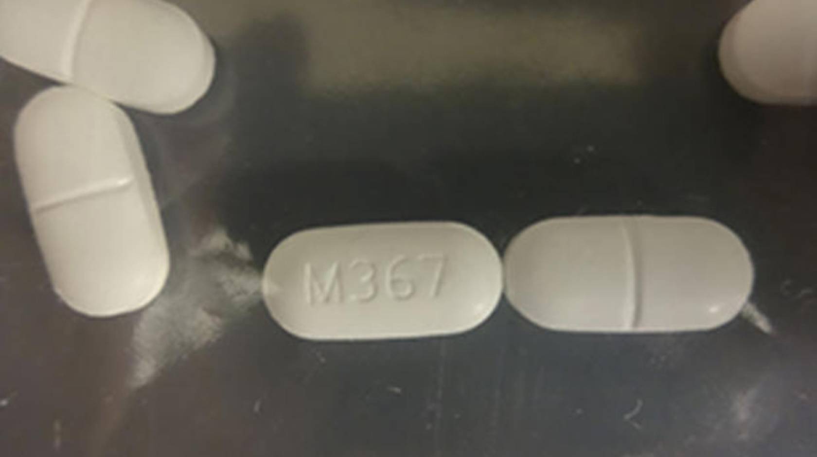 Seized counterfeit hydrocodone tablets.