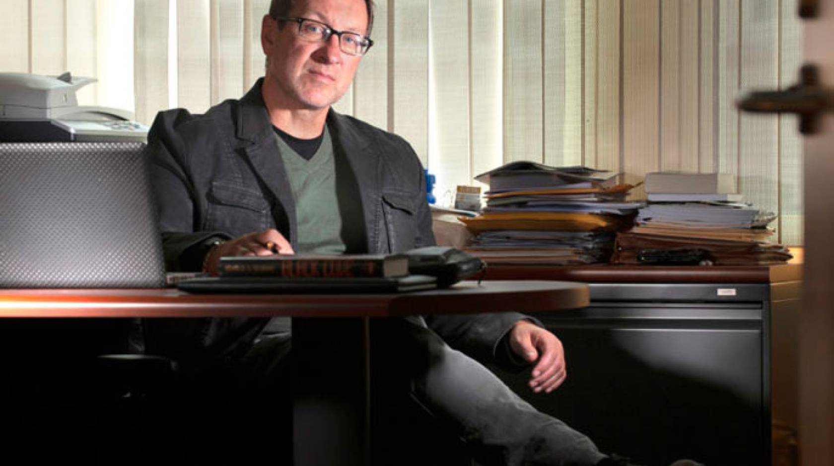 Richard Matthew at desk