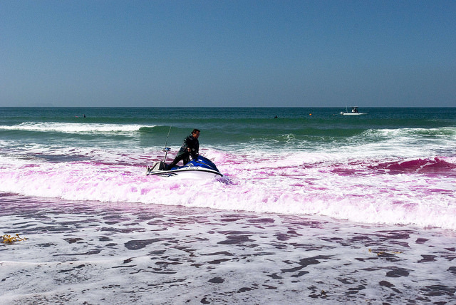 pink dye in ocean water