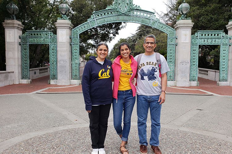 Anjika Pai at Sather Gate with her mom, Samhita, left, and dad, Ganesh, right