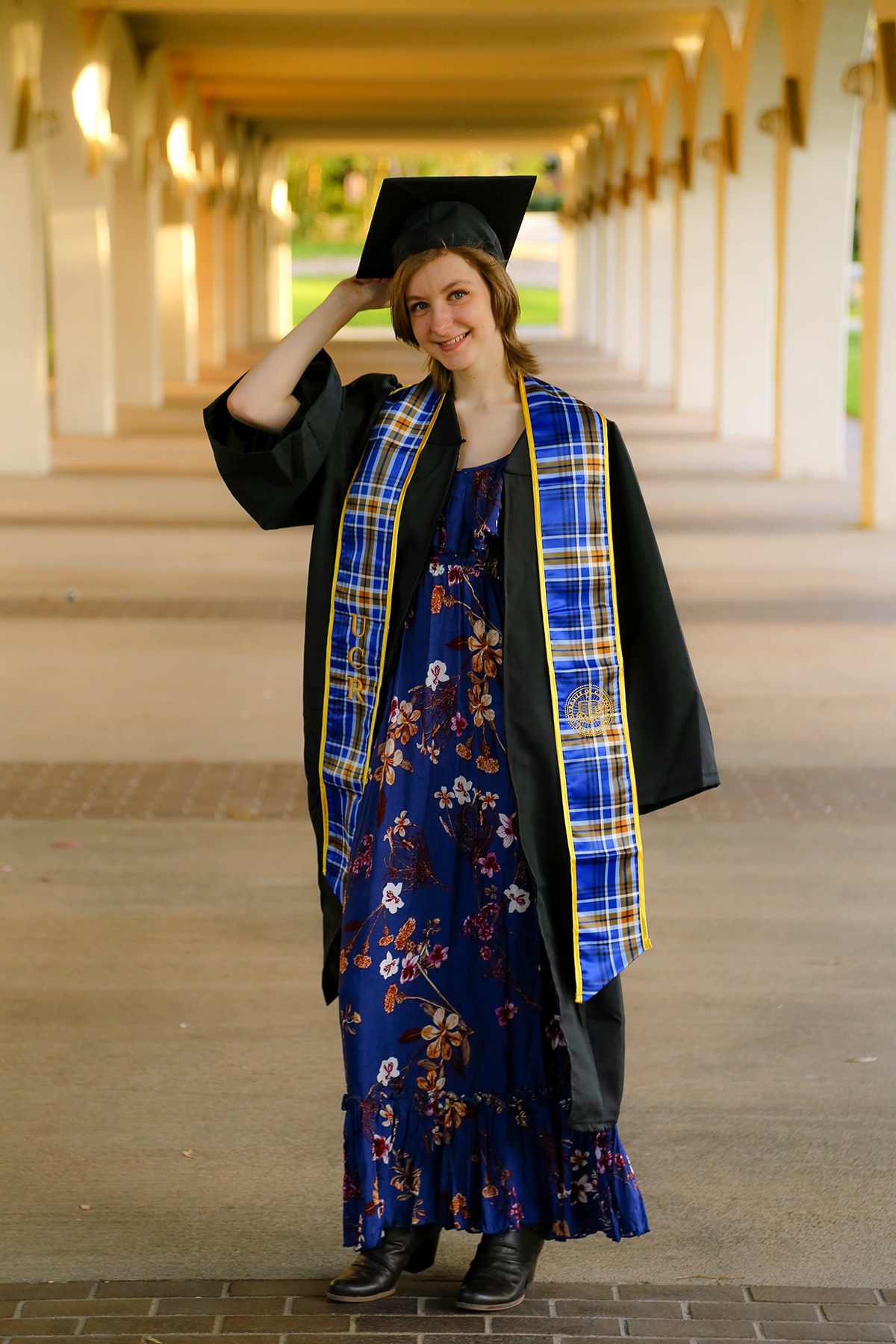Sheridan Cetera in graduation stole and cap