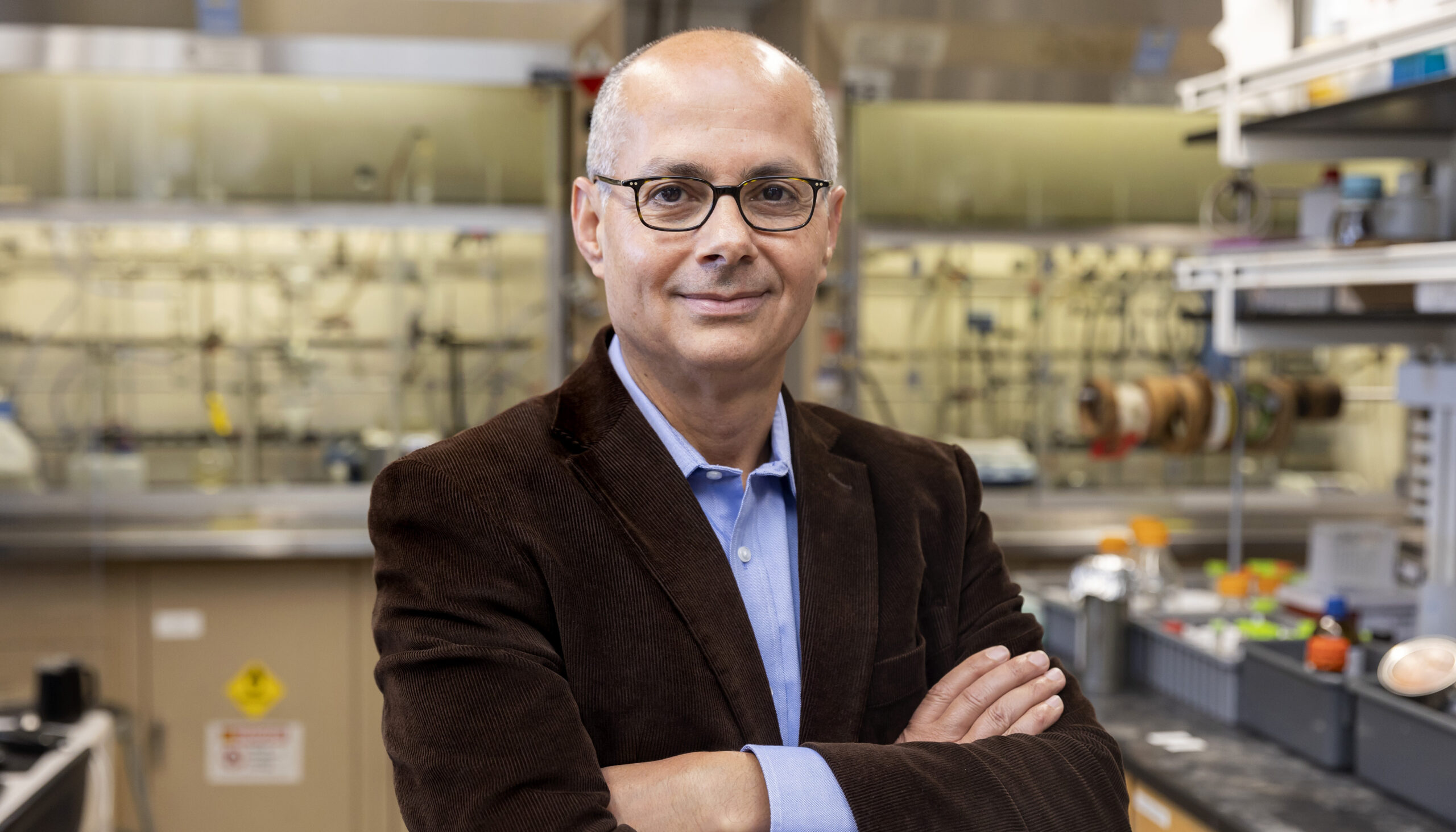 UC Berkeley professor Omar Yaghi wins the Nobel Prize in chemistry A man with glasses in a brown jacket smiles at the camera in a lab (Omar Yaghi)