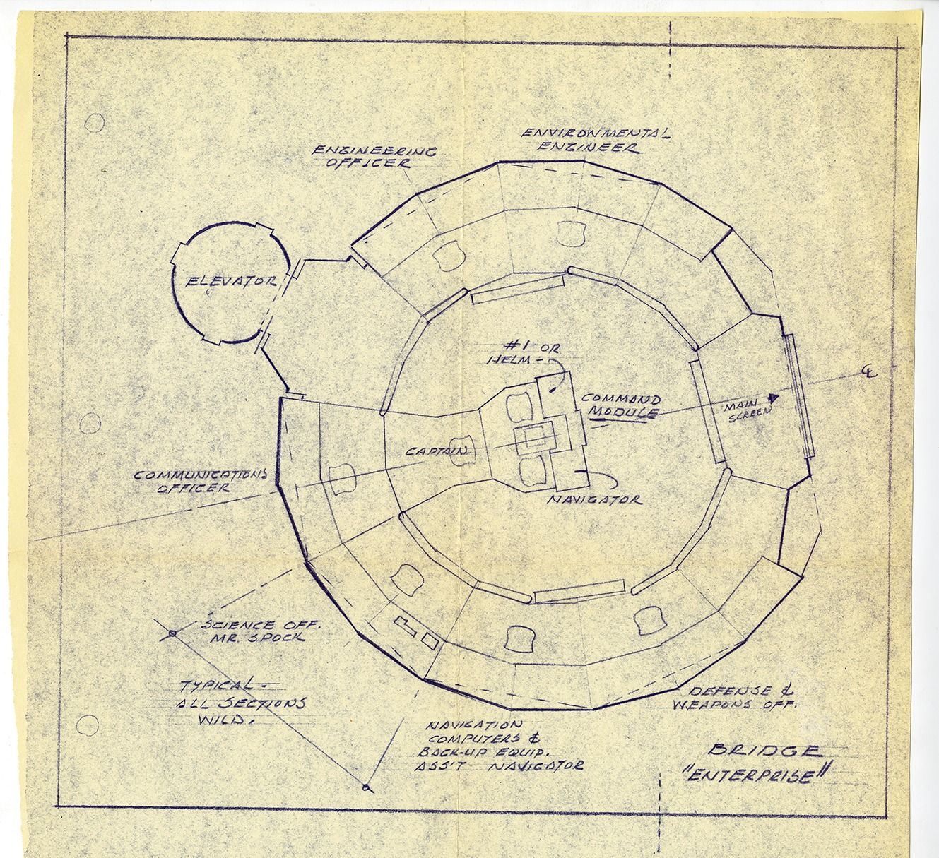 A blueprint of the USS enterprise on yellowed paper