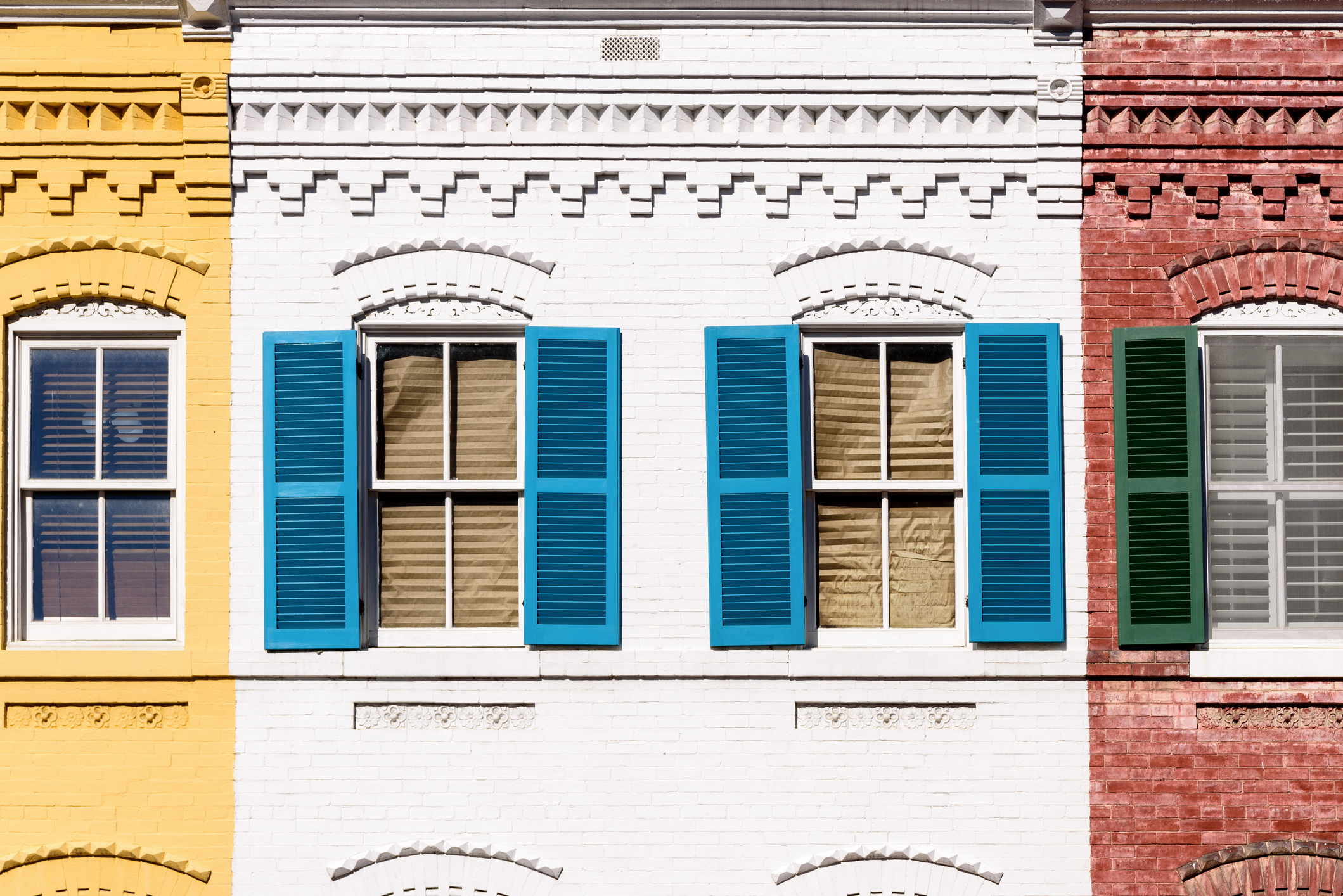 A brick wall painted white