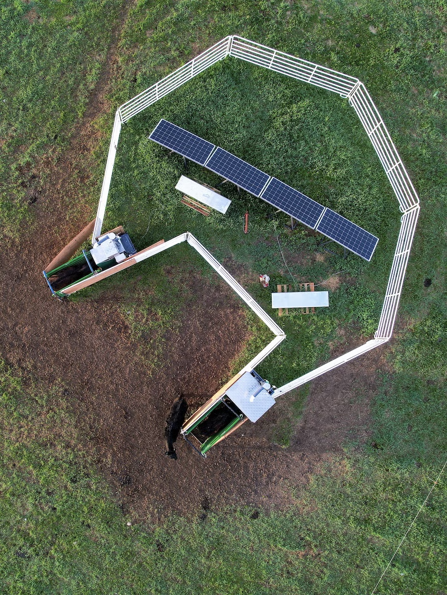 aerial view of a feeding machine in a field