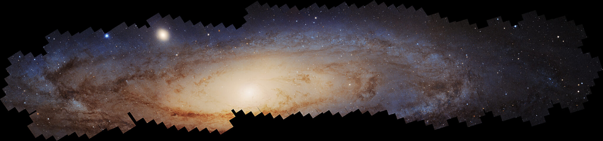 Glowing, swirling stars in a panorama: A photomosaic panorama of the Andromeda galaxy assembled over 10 years by the Hubble Space Telescope