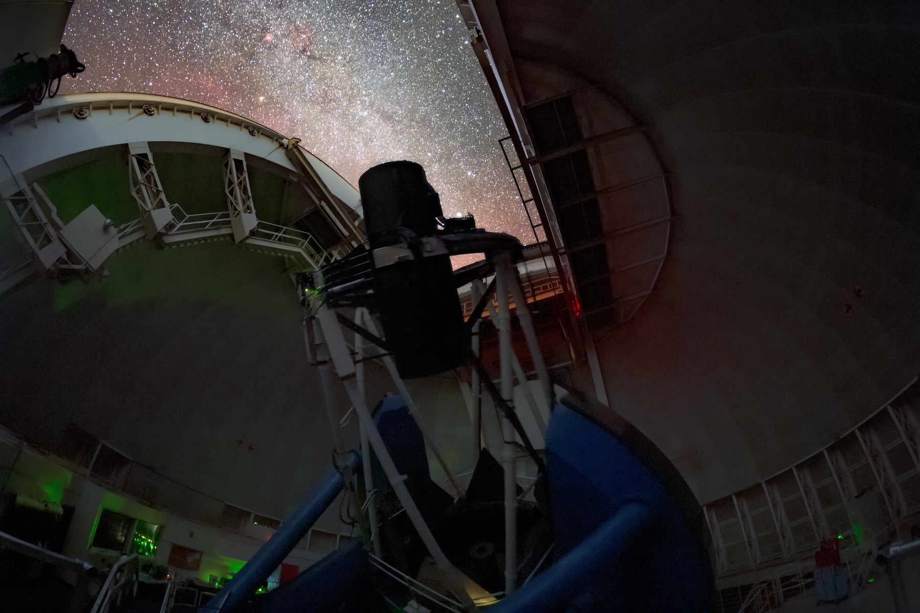 A telescope dome open to the night sky