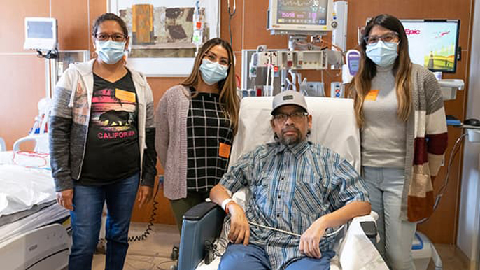Federico Gomez Gil with his wife and two daughters in the hospital