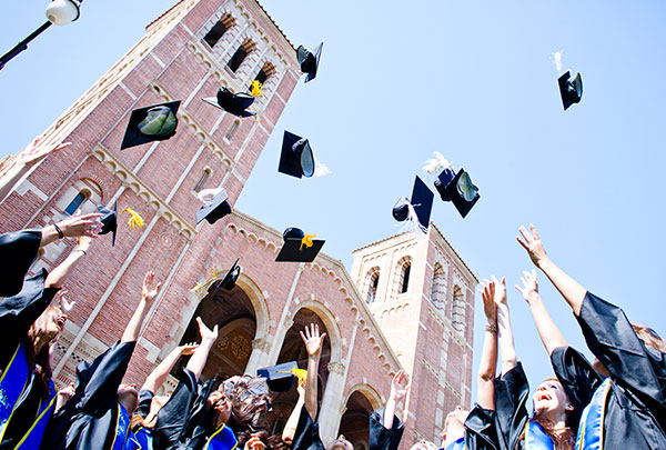 UC graduation cap tossing