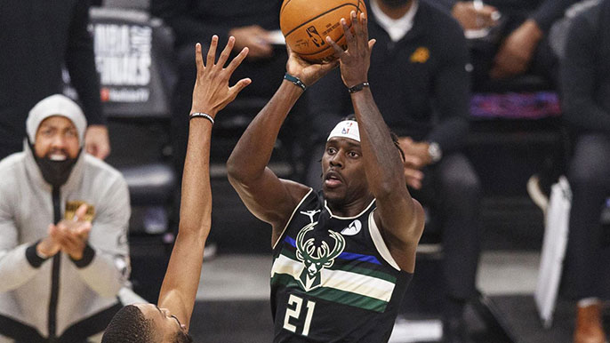 Jrue Holiday takes a shot for the Bucks