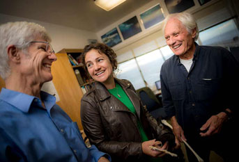 Meir and two former advisers