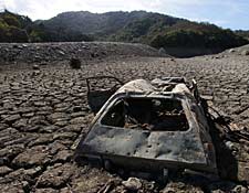 Car emerges from dried reservoir