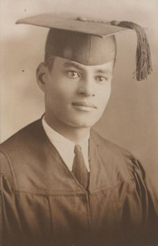 Ralph Bunche in graduation cap and gown