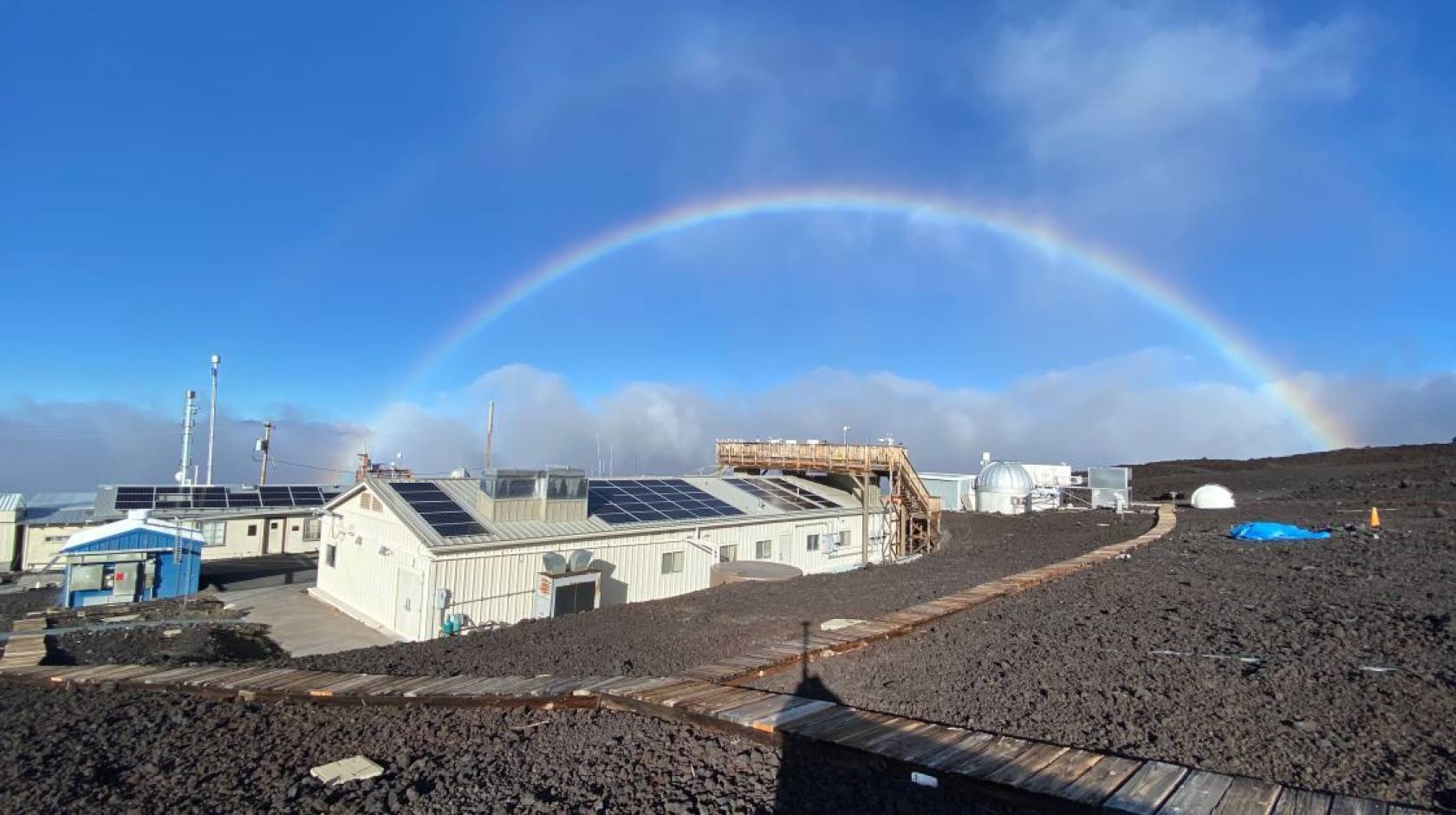 Rainbow frames NOAA’s Mauna Loa Observatory.
