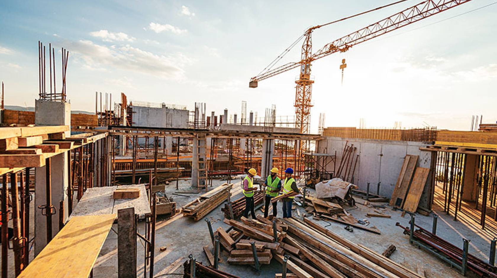 Construction workers at an urban building site