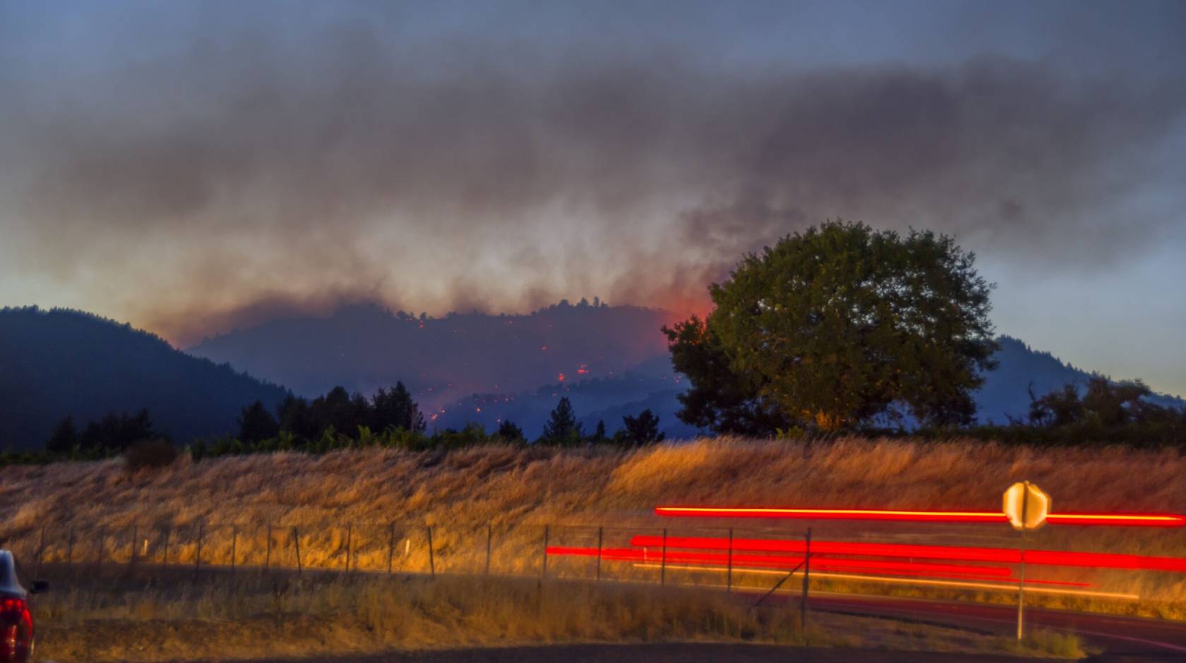 Wildfire burns at dusk