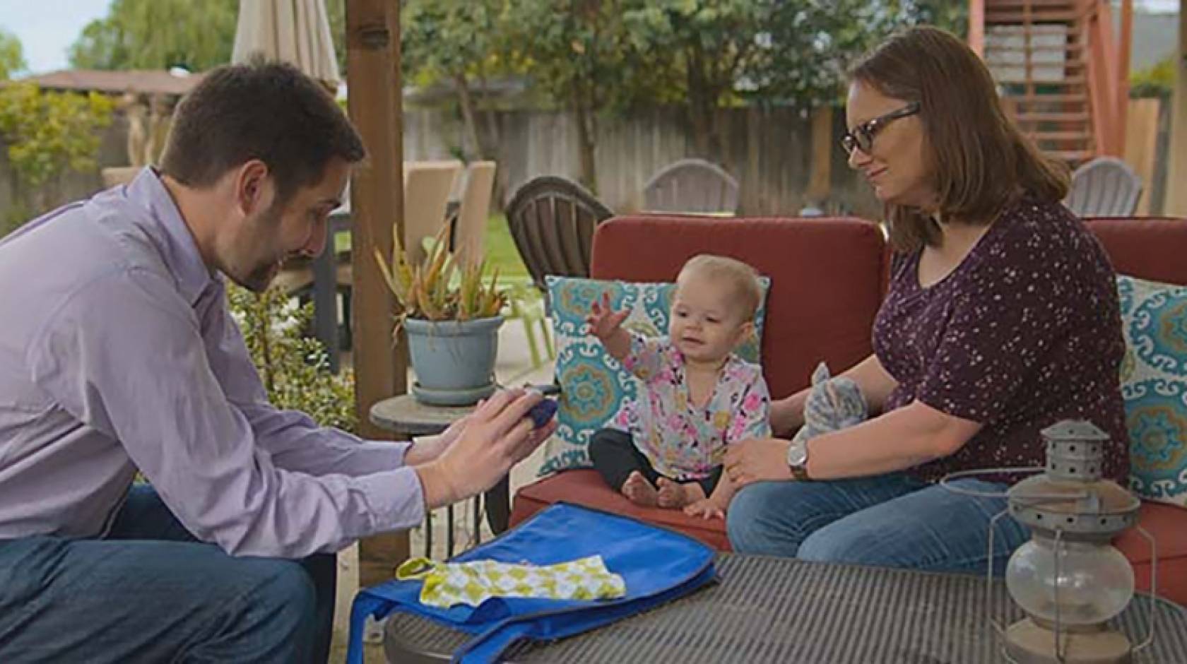 Professor Eric Walle with Penelope and her mom, Jessica Mohatt, in a scene from the new Netflix docu-series "Babies."