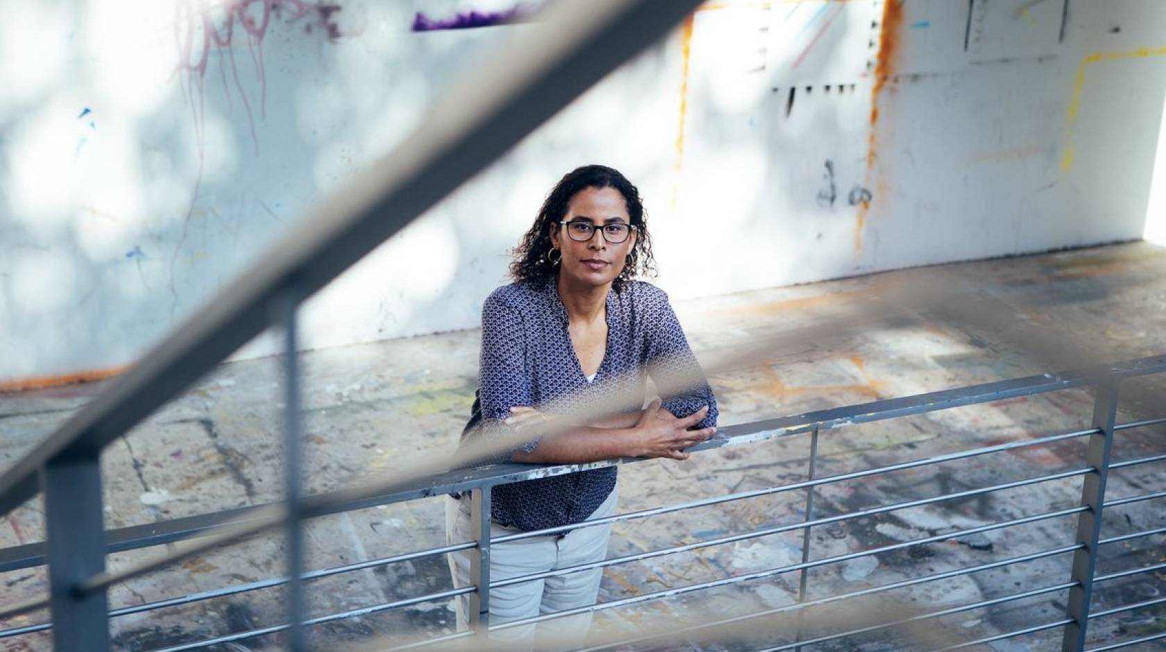 Woman with glasses photographed from above