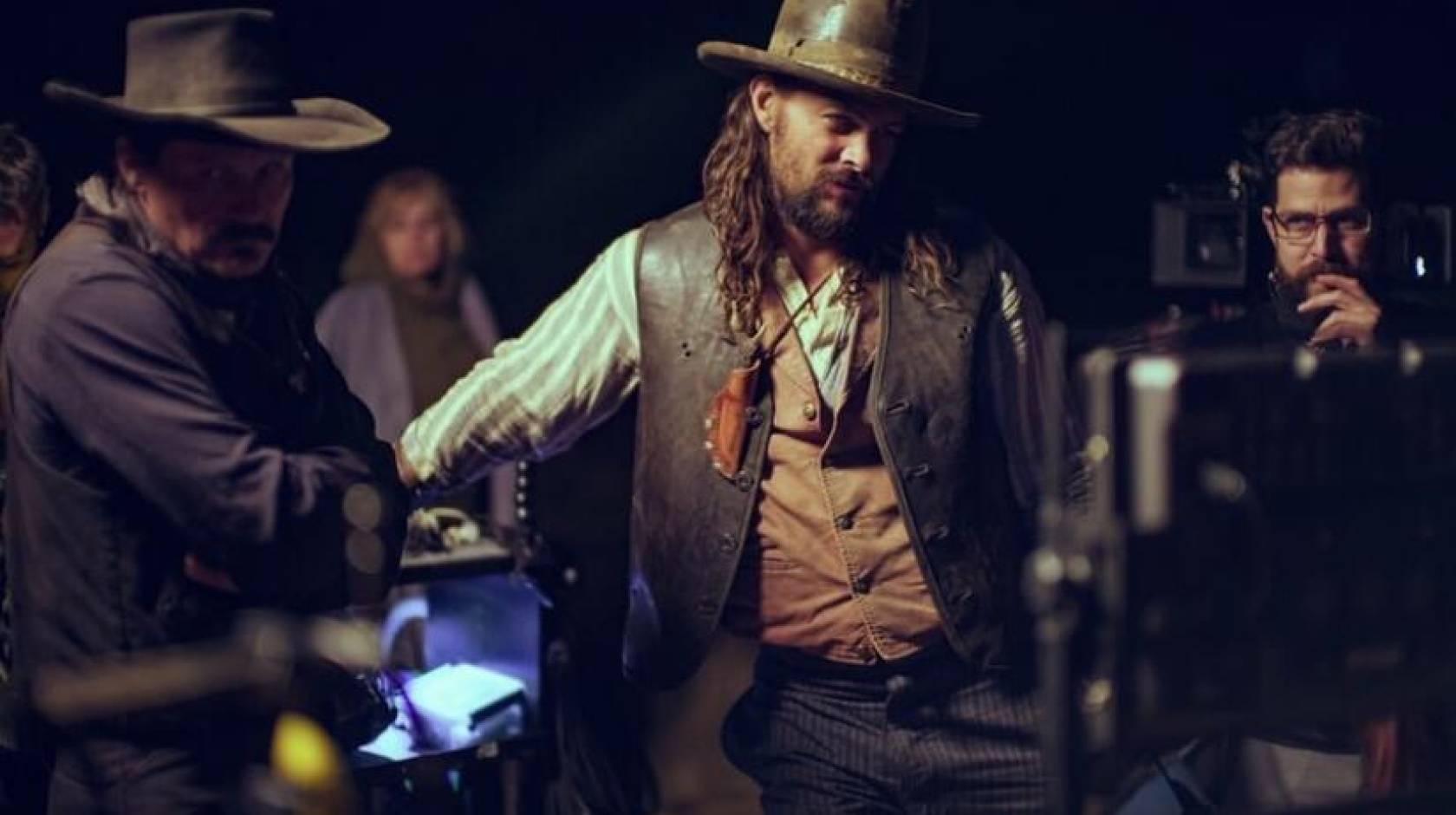 Bearded Jason Momoa in Western clothes on the set of his new movie The Last Manhunt