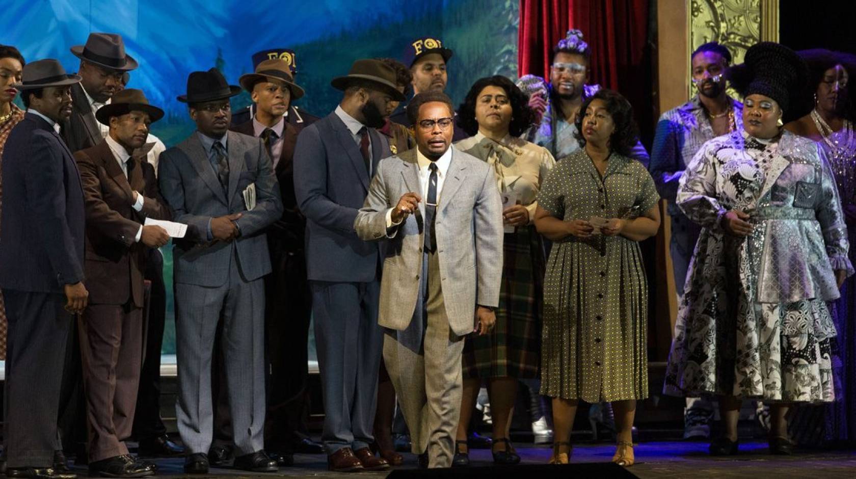 The cast of "X: The Life and Times of Malcolm X" on stage at the Metropolitan Opera, in 1950s era costuming