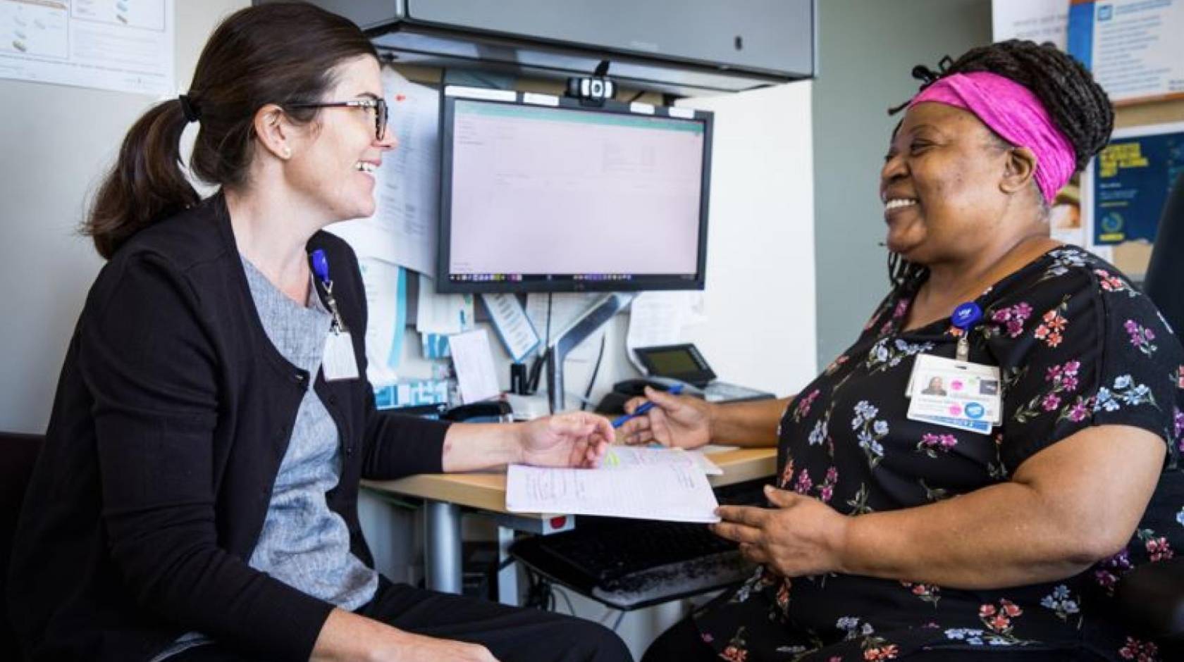 Two nurses in conversation