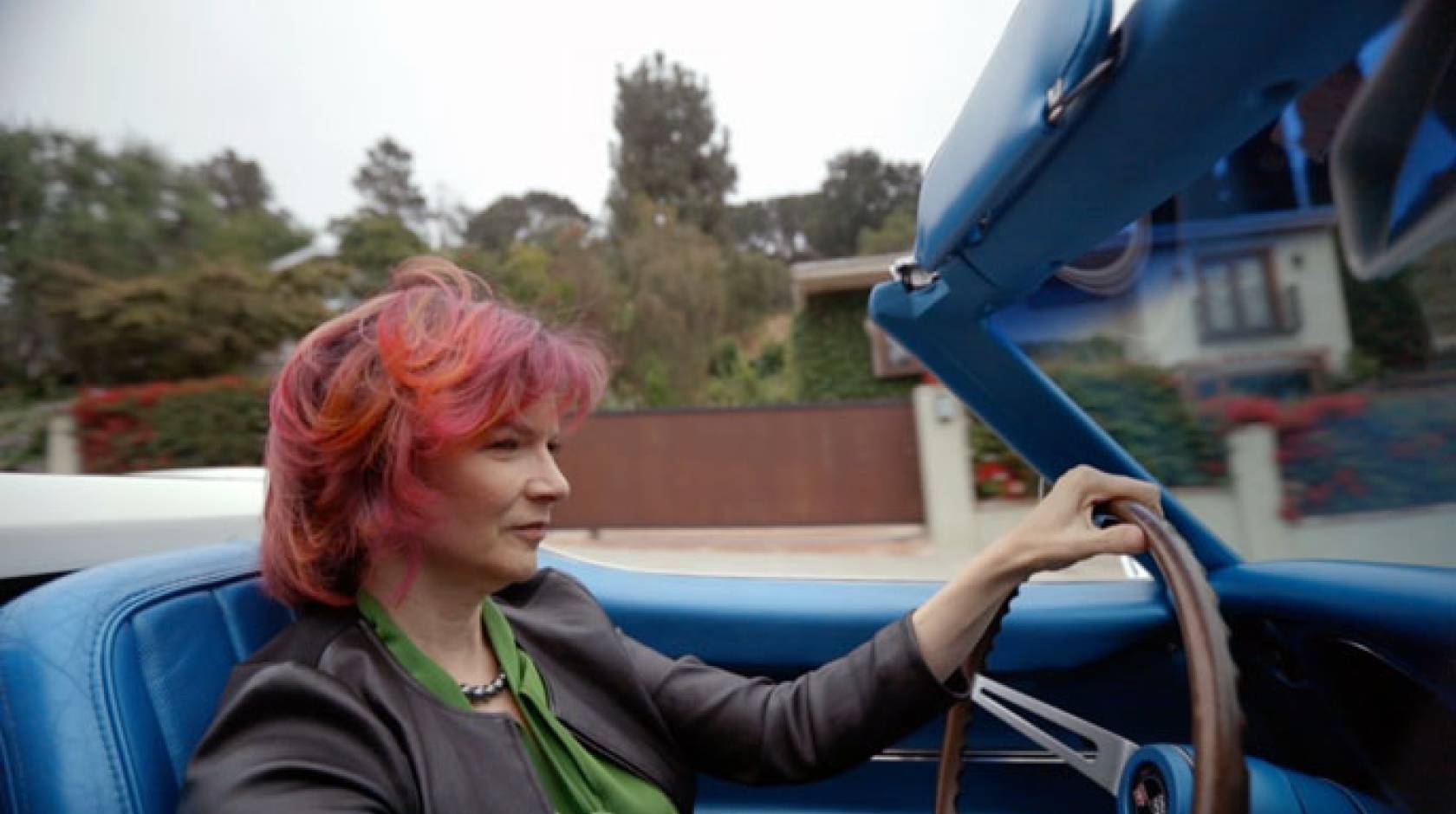 Rachelle Crosbie-Watson driving her Corvette