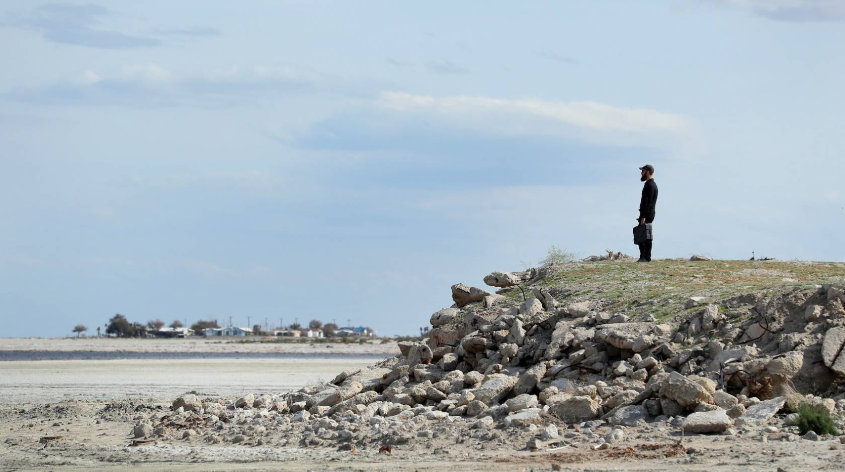 A man looks over the dry Salton Sea