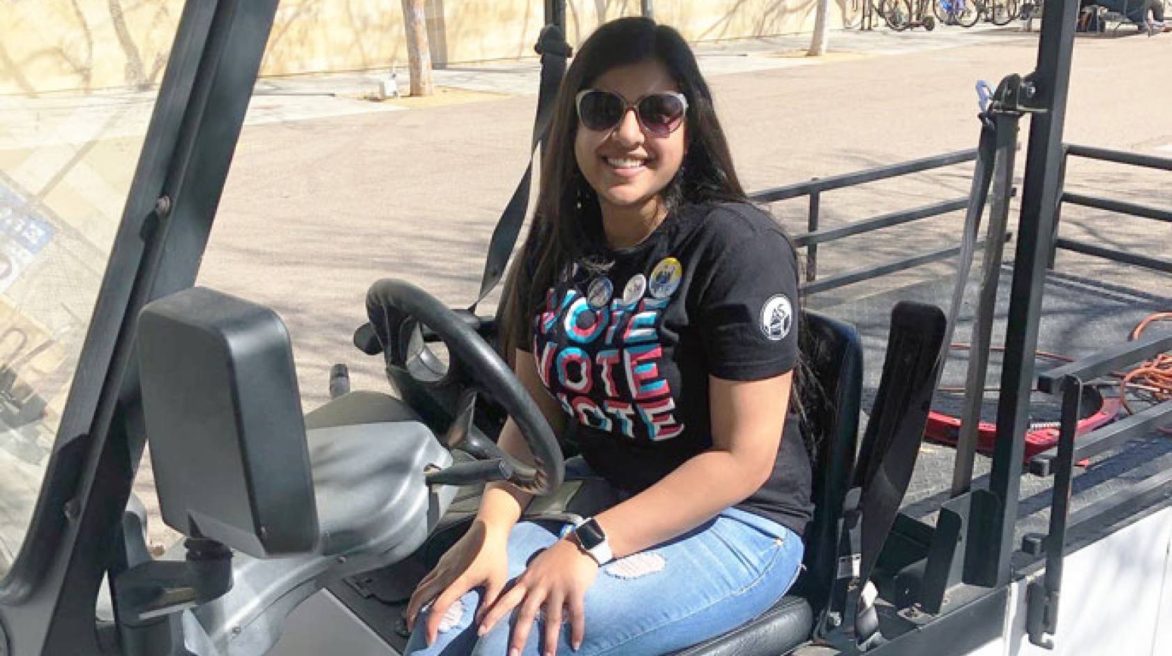 Alisha Saxena in golf cart