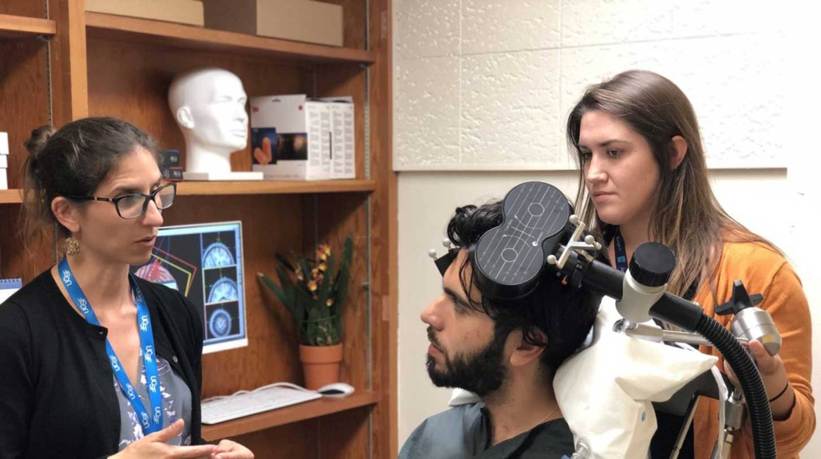 a doctor works with a patient