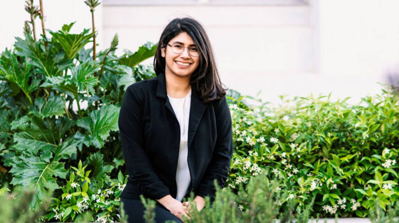 Graciela Serratos portrait outside with plants