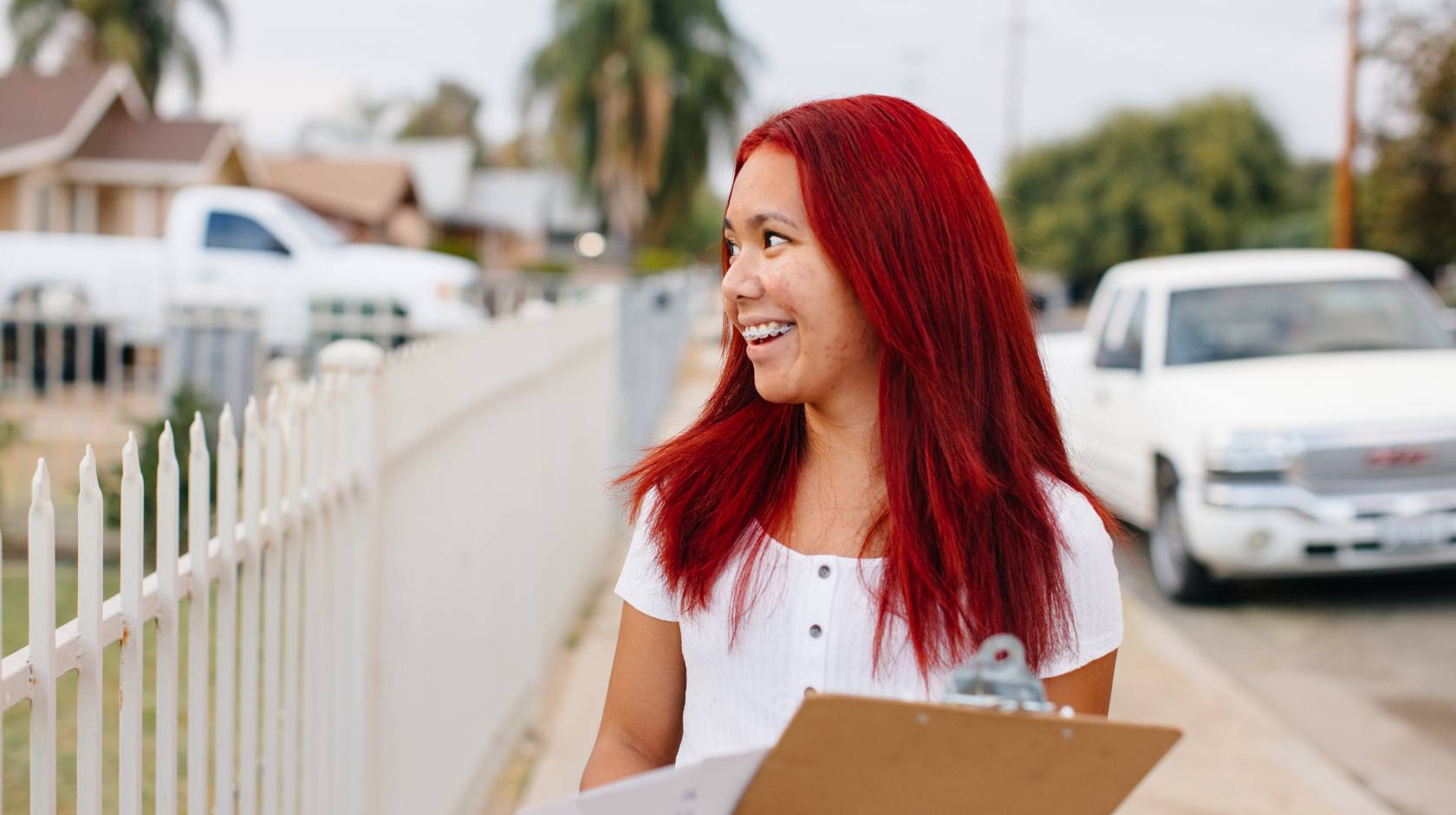 Jessa Fate Bayudan, a UCLA student involved in Freedom Summer, knocks on doors to register voters in Delano