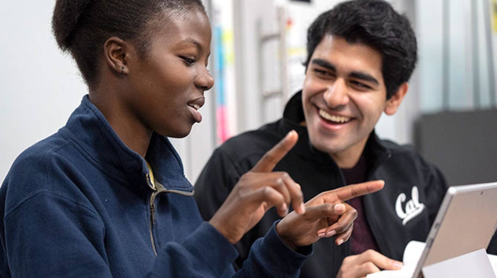 Two students talking together