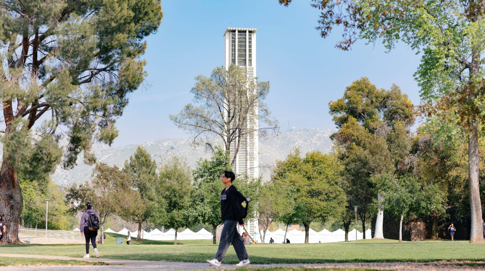 UC Riverside campus on a sunny day, tower in the background