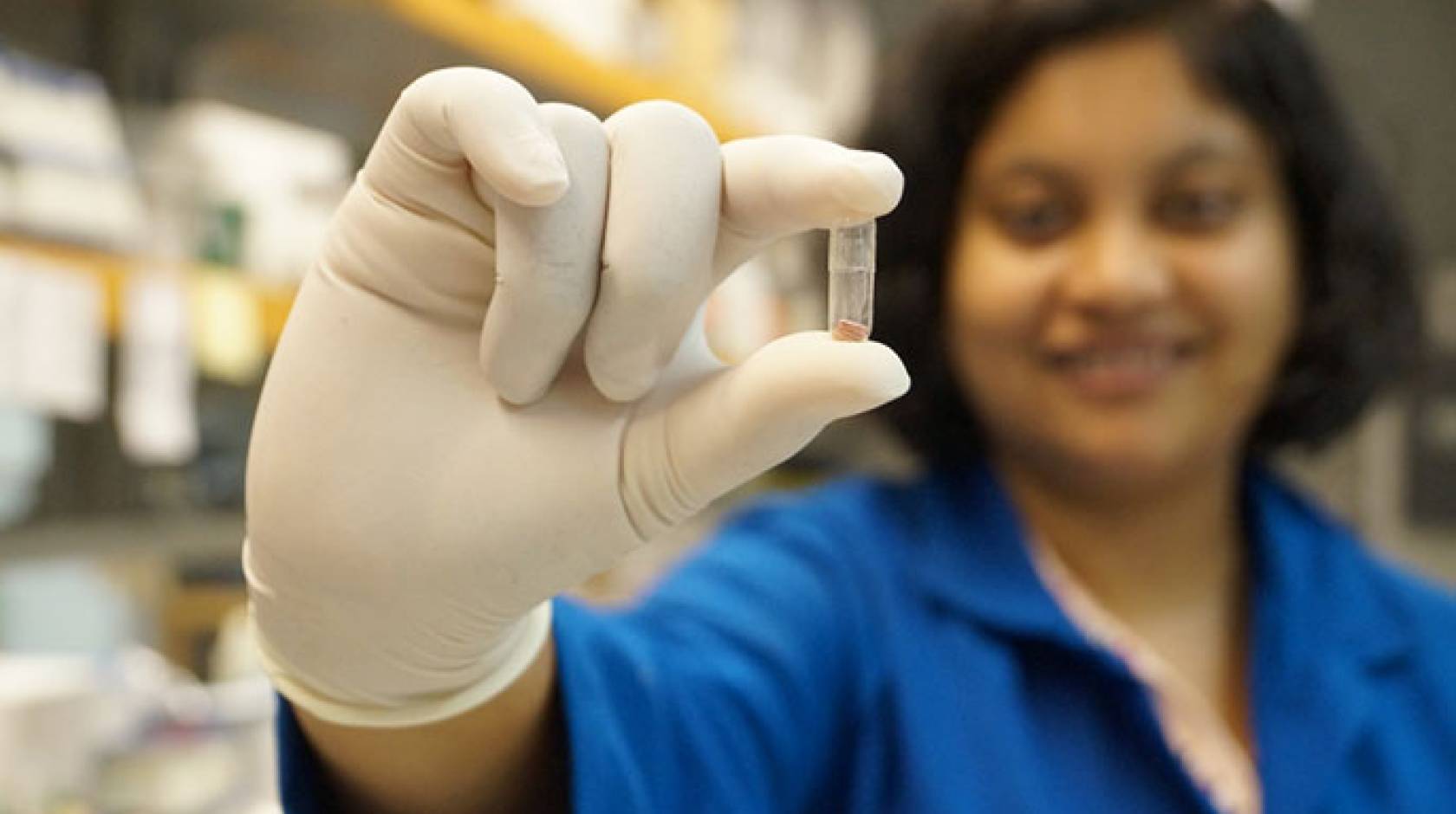 Amrita Banerjee holds capsule