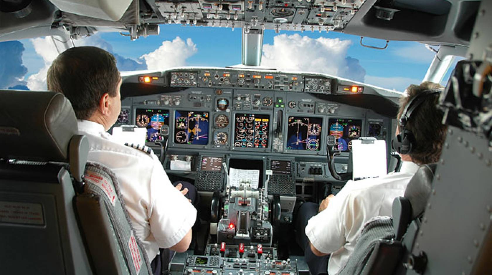 pilots in cockpit