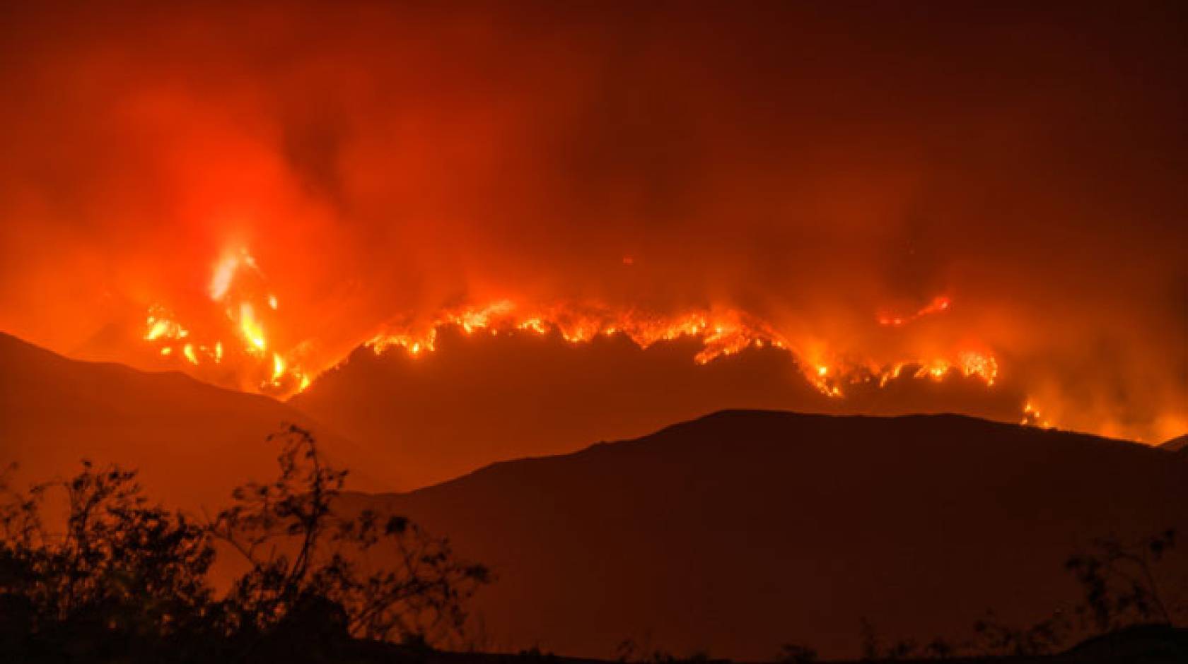 A raging red fire on a ridge