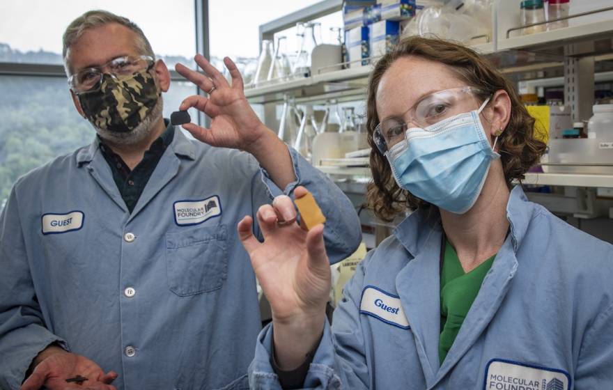 Berkeley Lab scientists Brett Helms and Corinne Scown hold samples of PDK plastic, a unique new material that can be recycled indefinitely