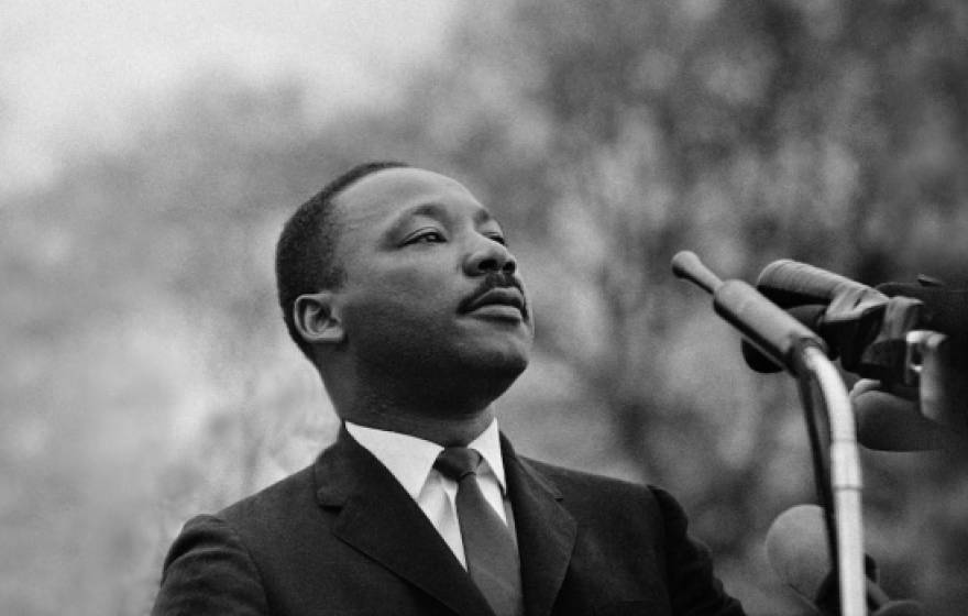 Martin Luther King Jr. at a microphone