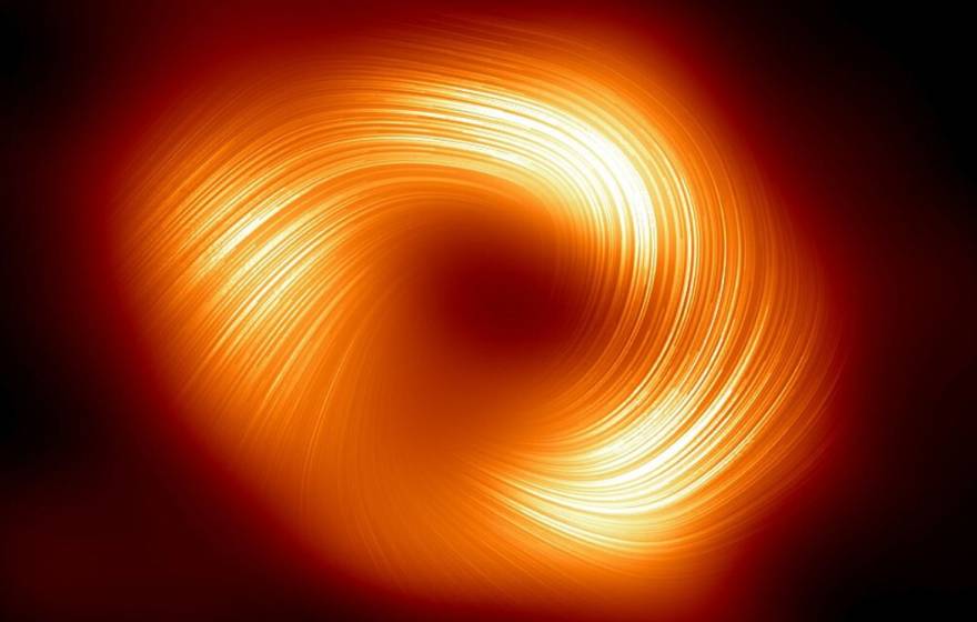 A swirl of yellow-red light against a black background