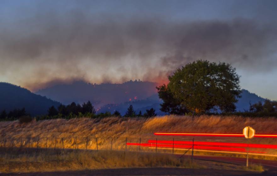 Wildfire burns at dusk