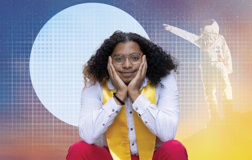 Brandon Lazard A young man with shoulder-length hair on his shoulders, wearing a stole, smiles at the camera propping up his chin, with the background bearing a gradient illustration of an astronaut pointing at the moon