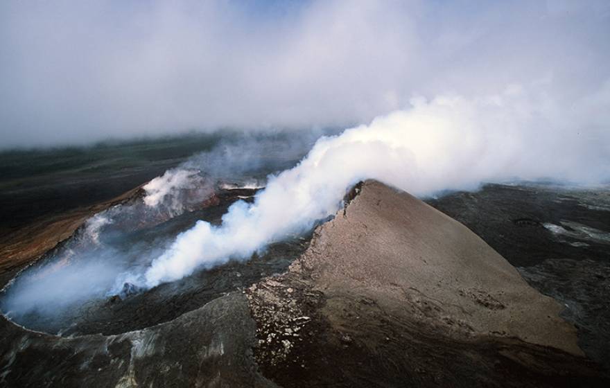 Kīlauea volcano in Hawaii smoking, seen from above