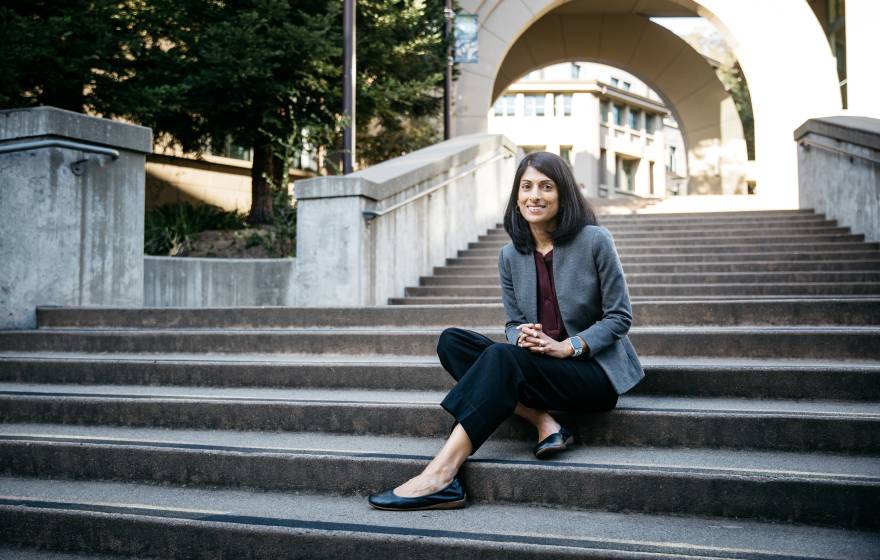 2025 MacArthur fellows A professor sits on stairs on the UC Berkeley campus
