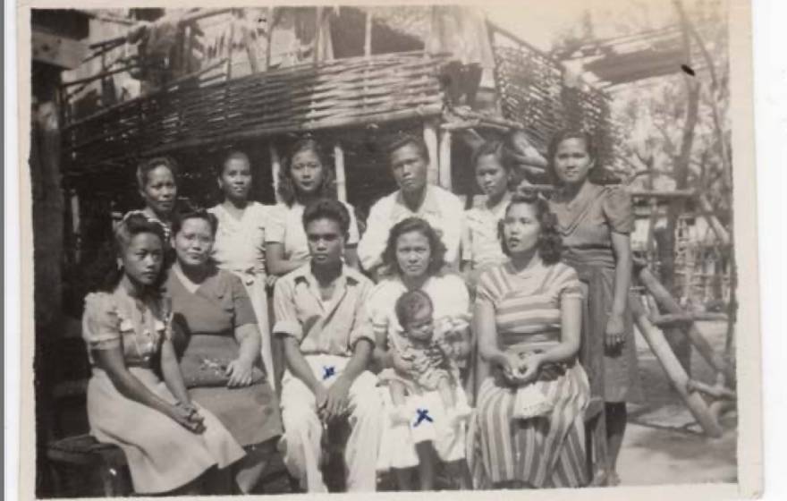 Preserving Filipino stories In an old black-and-white photo, a family poses outside