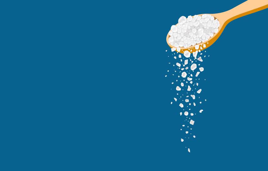 A graphic of a spoon overfilled with salt, some spilling