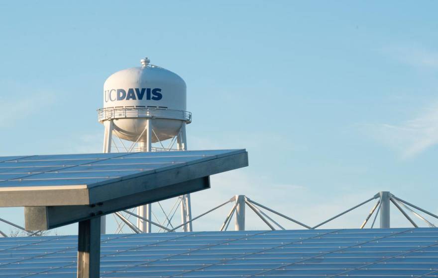 UC Davis water tower with solar panels in front