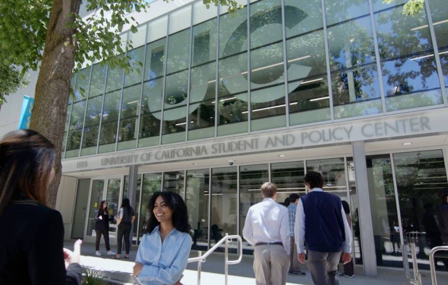 Exterior view of the UC Student and Policy Center, with people walking around outside